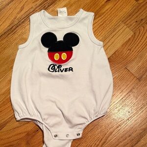 Nola White Baby Onesie with Black Design